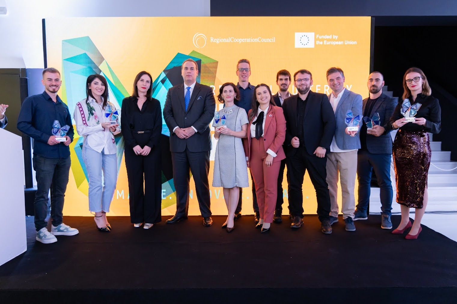 Winners of 2024 Regional Butterfly Innovation Award with RCC's Head of Office of the Secretary General Elda Kalaja and Deputy Prime Minister of Montenegro for Foreign and European Affairs, Filip Ivanovic at an award ceremony on 26 November 2024 in Podgorica (Photo: RCC/Danilo Papic)