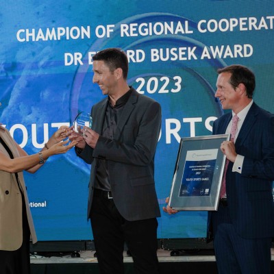 RCC Secretary General Majlinda Bregu awarding 2023 Champion of Regional Cooperation Dr Erhard Busek to Youth Sports Games together with the representative of Austrian Ministry for European and International Affairs, Thomas Stölzl, in Skopje on 13 June 2024 (Photo: RCC/ Armand Habazaj)